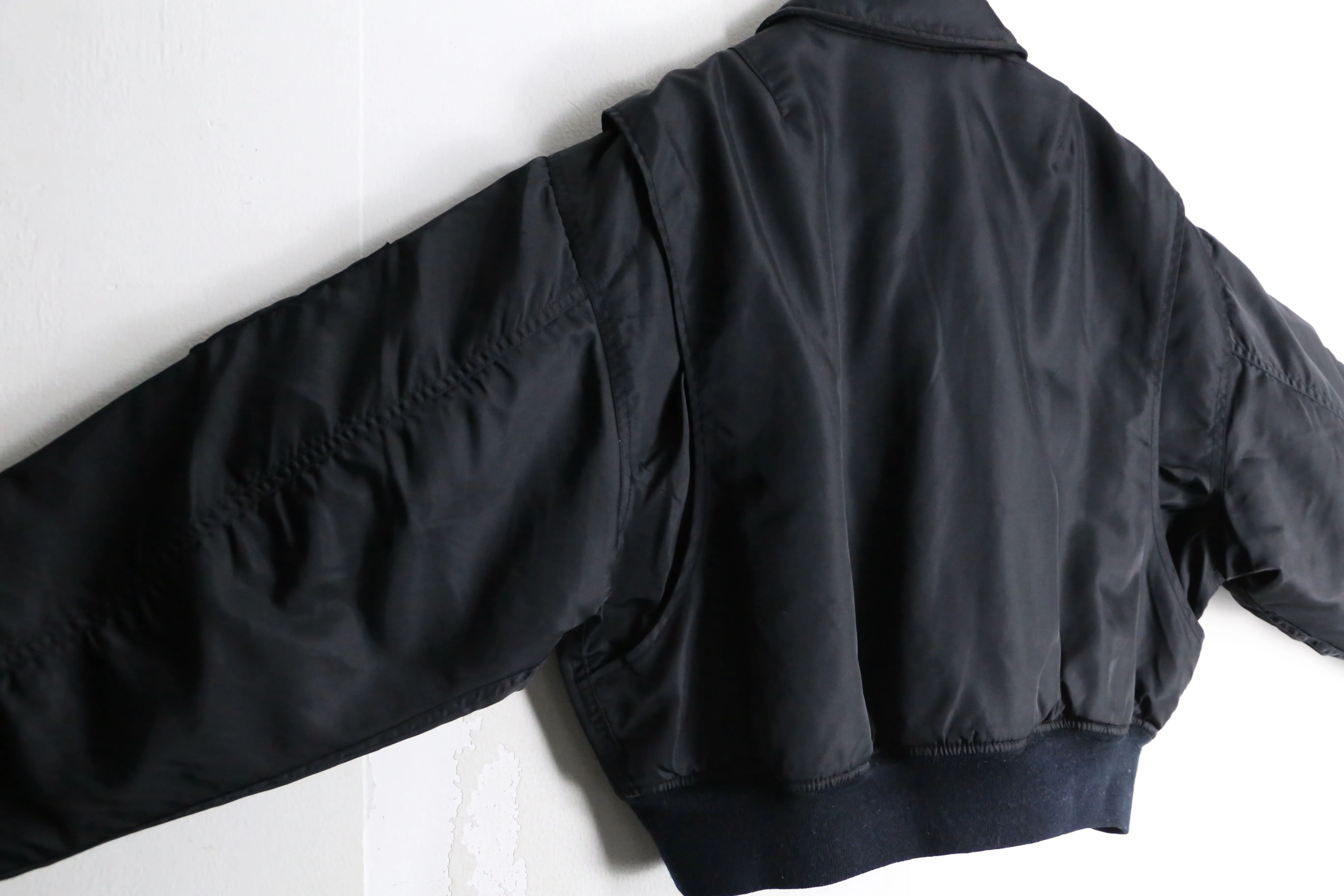 black color short length flight jacket