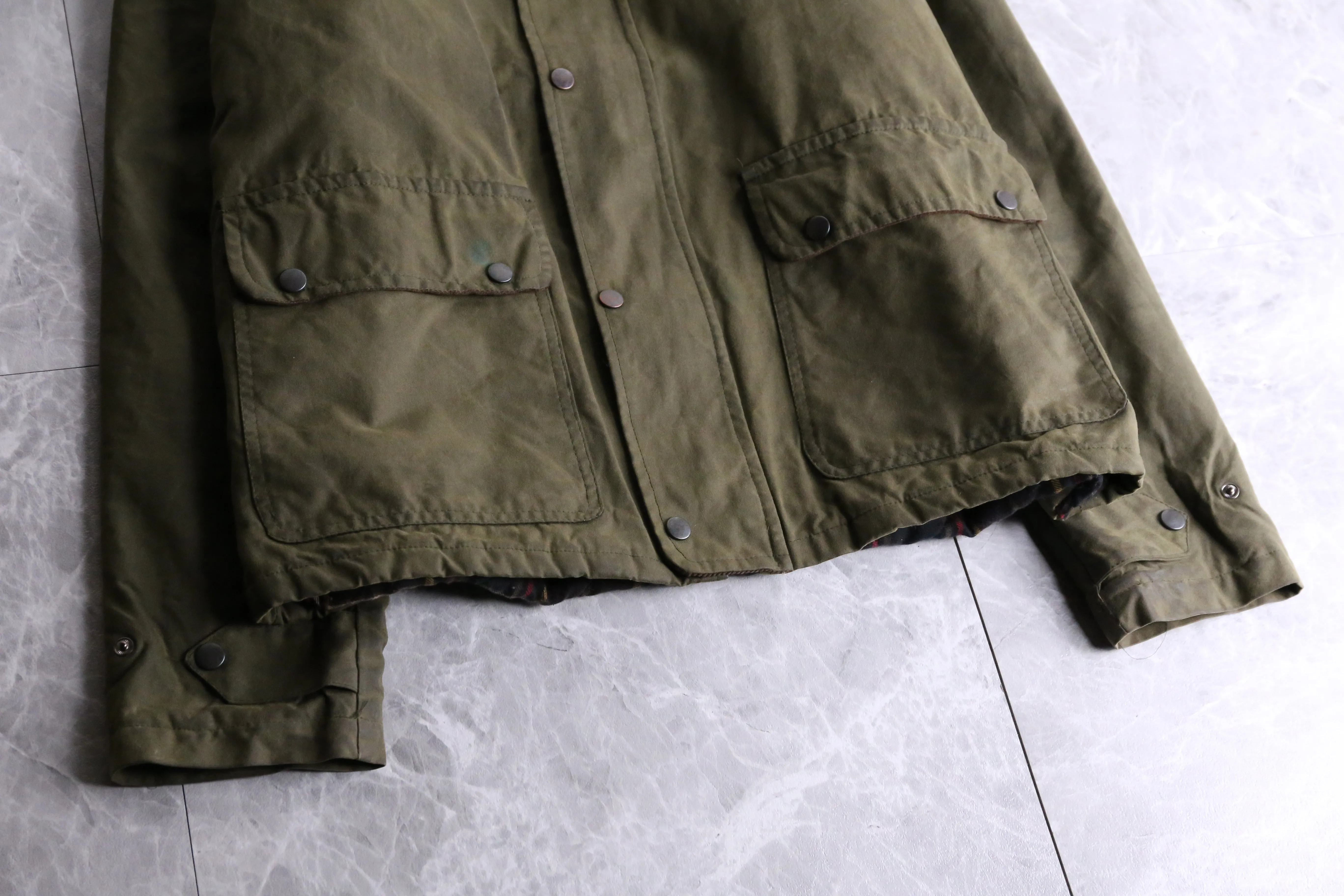 khaki short length oiled jacket