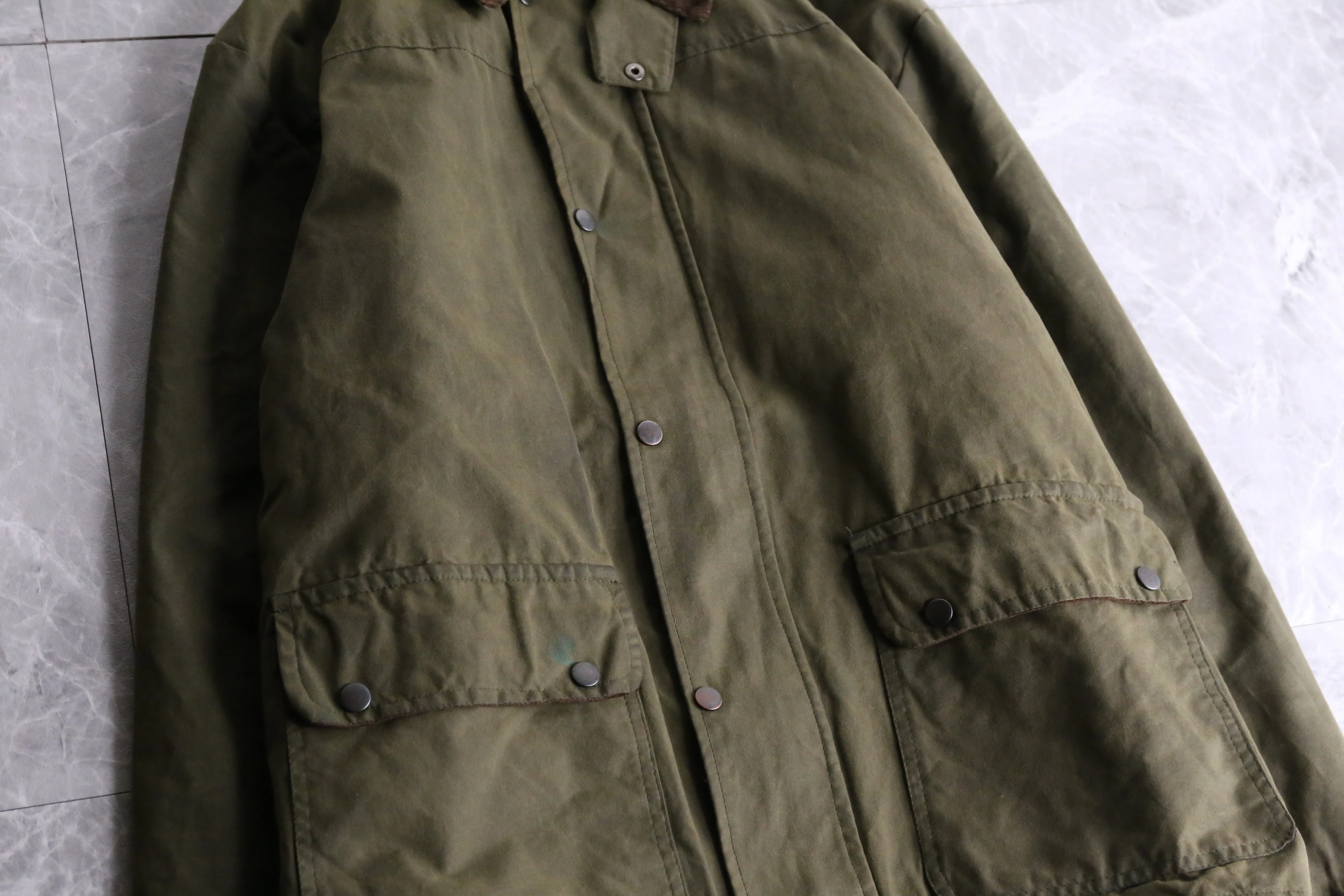 khaki short length oiled jacket