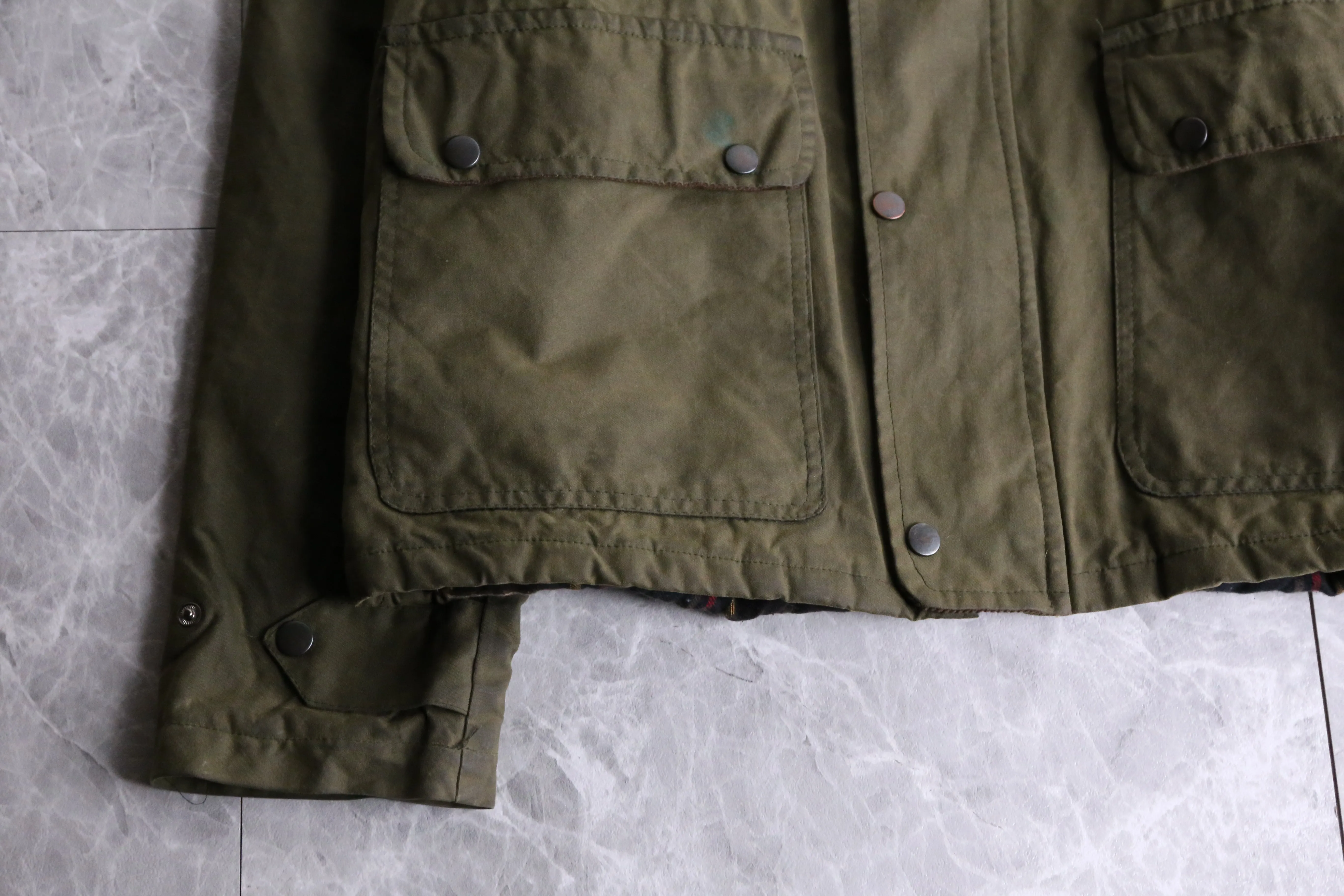 khaki short length oiled jacket