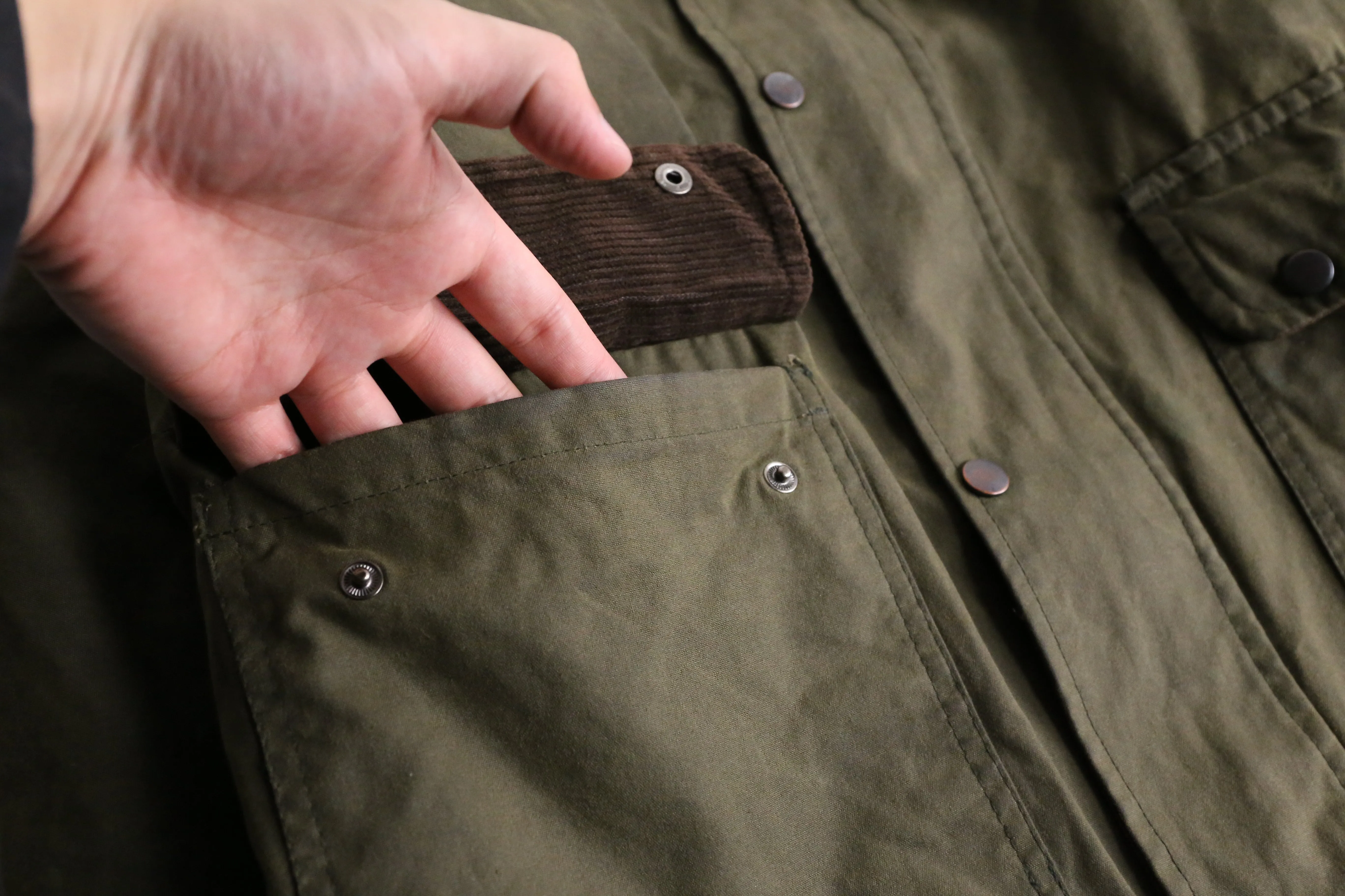 khaki short length oiled jacket